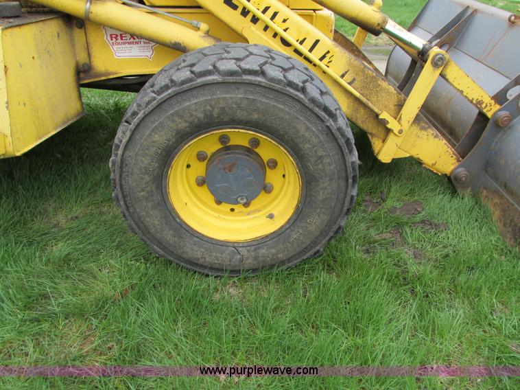 image for item E4713 2000 New Holland 575E backhoe