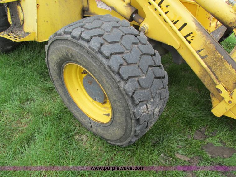 image for item E4713 2000 New Holland 575E backhoe