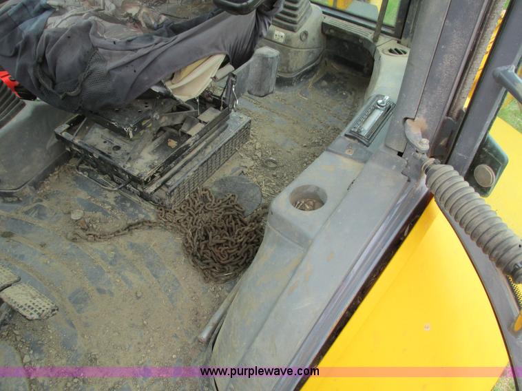 image for item E4713 2000 New Holland 575E backhoe