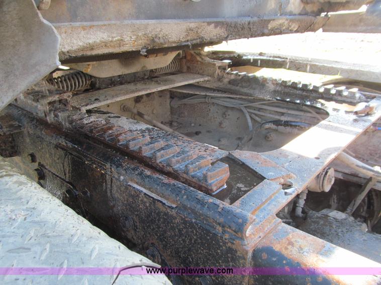 image for item E4718 1993 Ford LTL9000 tri axle semi truck