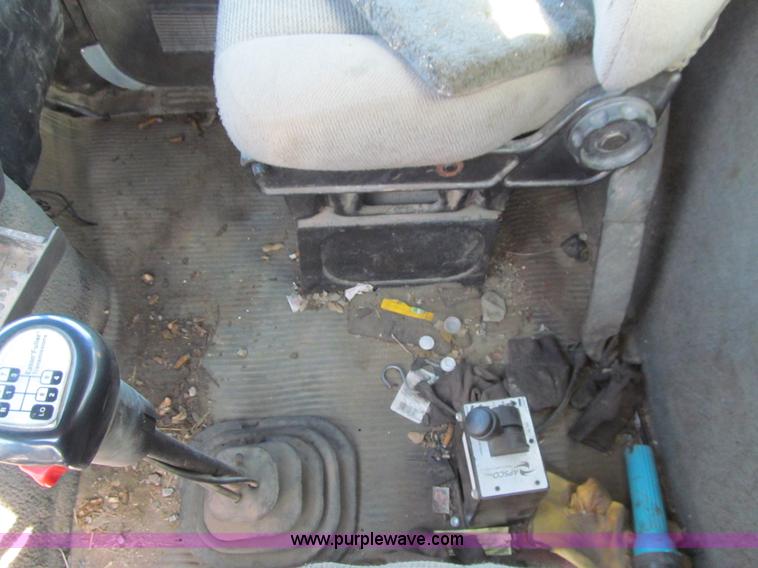 image for item E4718 1993 Ford LTL9000 tri axle semi truck