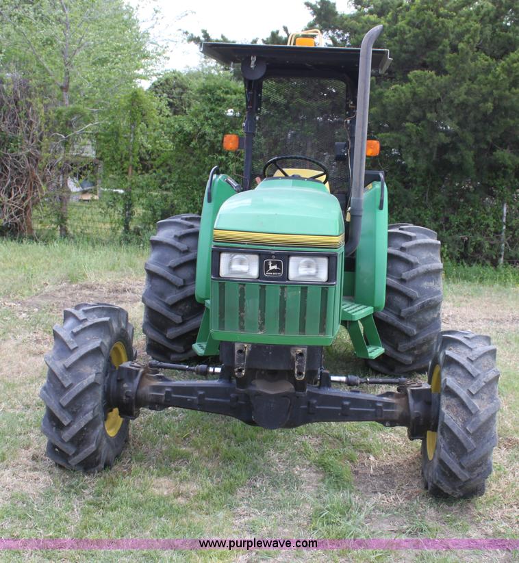 image for item H2066 1995 John Deere 5400 MFWD tractor