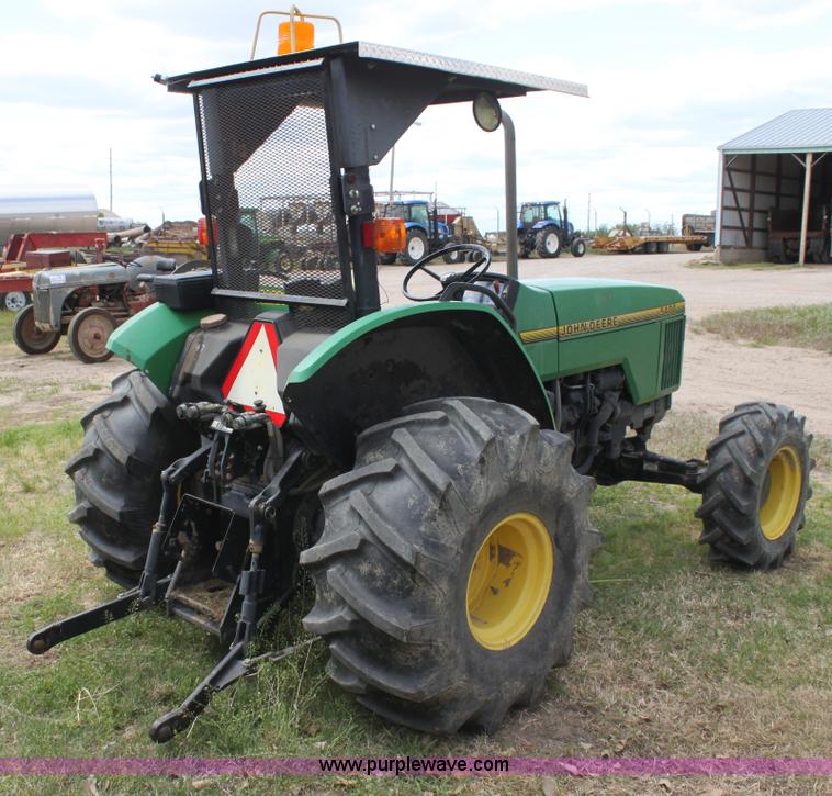 image for item H2066 1995 John Deere 5400 MFWD tractor