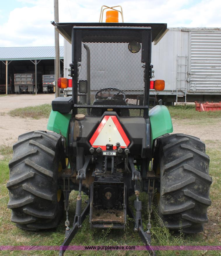 image for item H2066 1995 John Deere 5400 MFWD tractor