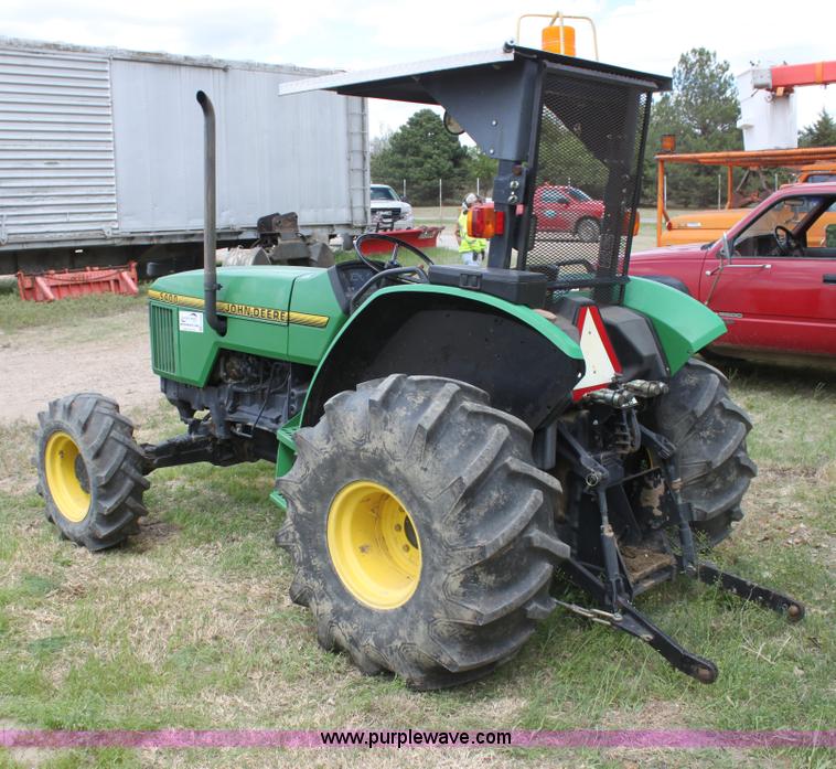 image for item H2066 1995 John Deere 5400 MFWD tractor