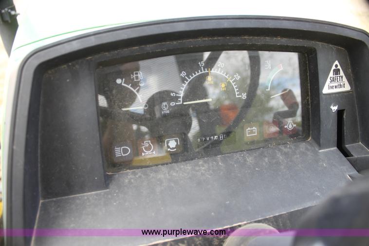 image for item H2066 1995 John Deere 5400 MFWD tractor