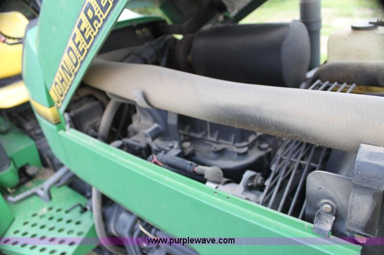 image for item H2066 1995 John Deere 5400 MFWD tractor