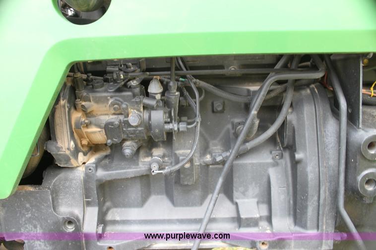image for item H2066 1995 John Deere 5400 MFWD tractor