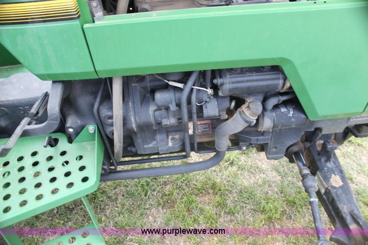image for item H2066 1995 John Deere 5400 MFWD tractor