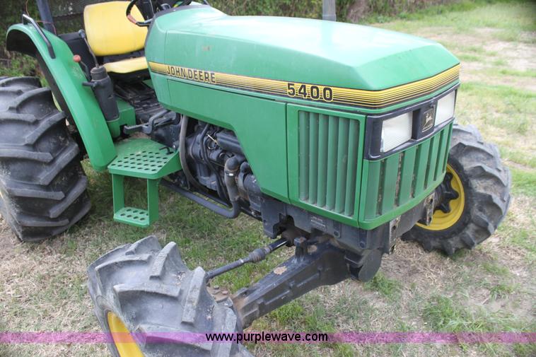 image for item H2066 1995 John Deere 5400 MFWD tractor