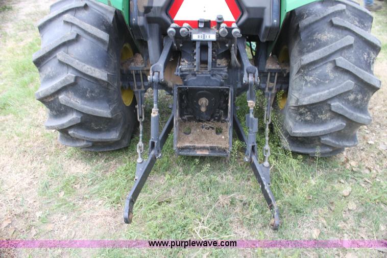 image for item H2066 1995 John Deere 5400 MFWD tractor