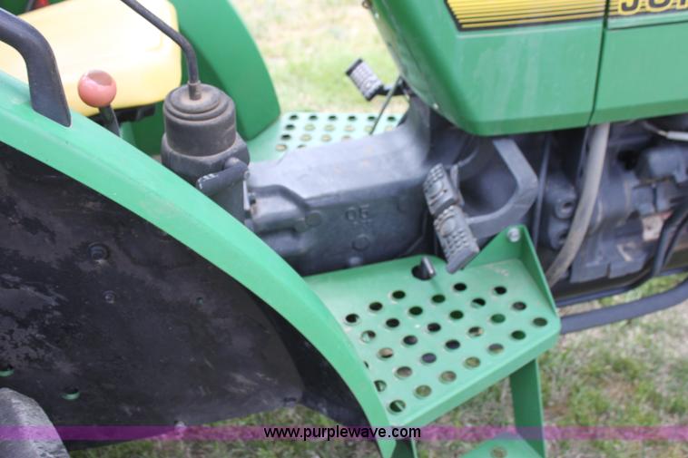 image for item H2066 1995 John Deere 5400 MFWD tractor