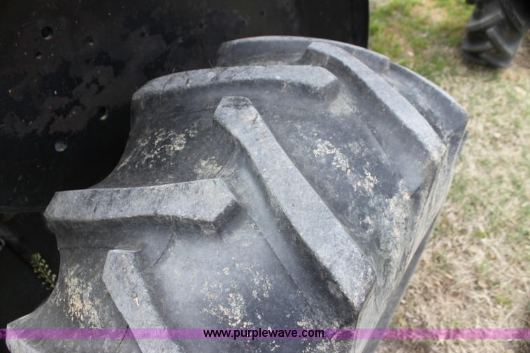 image for item H2066 1995 John Deere 5400 MFWD tractor