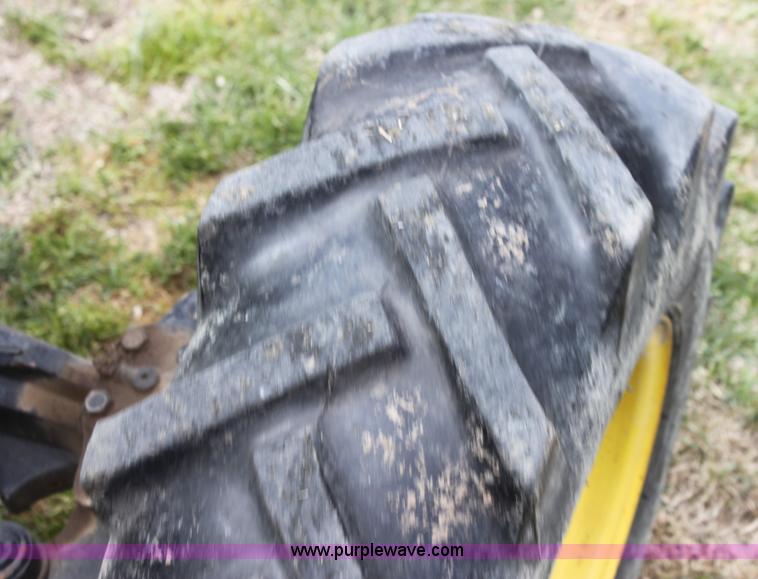 image for item H2066 1995 John Deere 5400 MFWD tractor