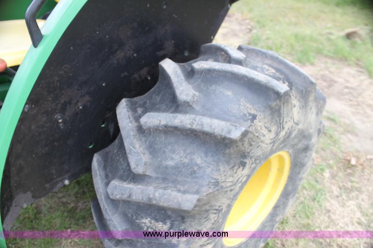 image for item H2066 1995 John Deere 5400 MFWD tractor