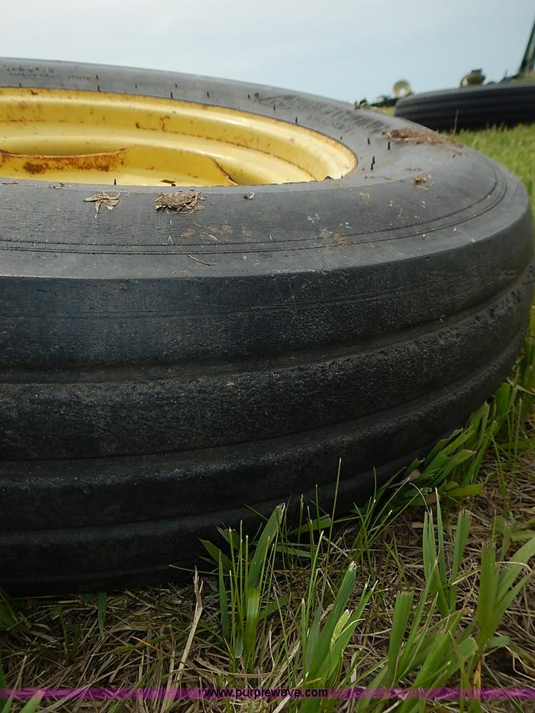 image for item AZ9974 (2) John Deere planter lift assist wheels