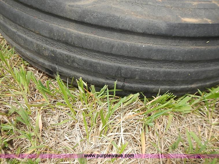 image for item AZ9975 (2) John Deere planter lift assist wheels