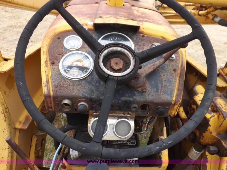 image for item H1878 International 2504 backhoe