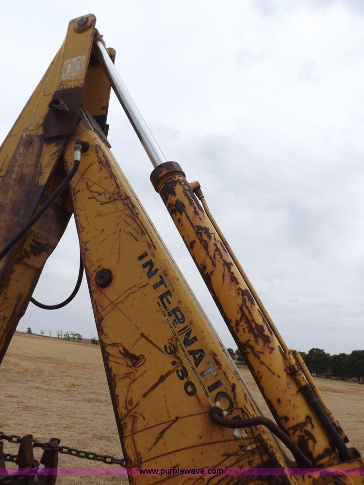 image for item H1878 International 2504 backhoe