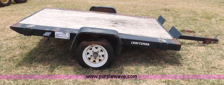 image for item H1885 Craftsman tilt deck trailer