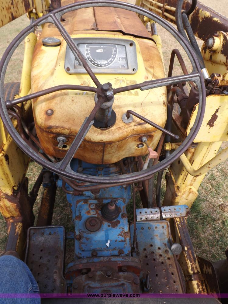 image for item H1893 1969 Ford C5011F backhoe