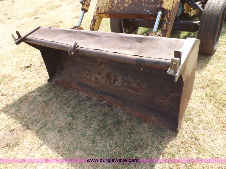 image for item H1893 1969 Ford C5011F backhoe