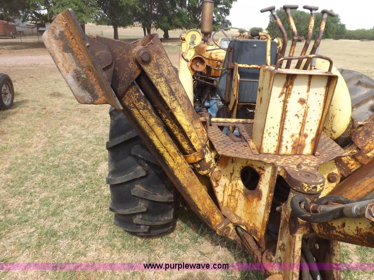 image for item H1893 1969 Ford C5011F backhoe