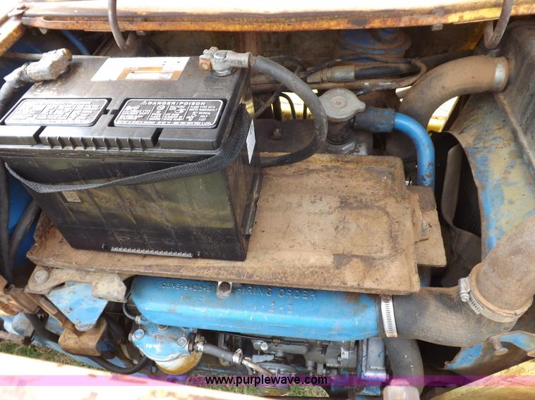 image for item H1893 1969 Ford C5011F backhoe