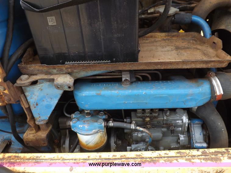 image for item H1893 1969 Ford C5011F backhoe