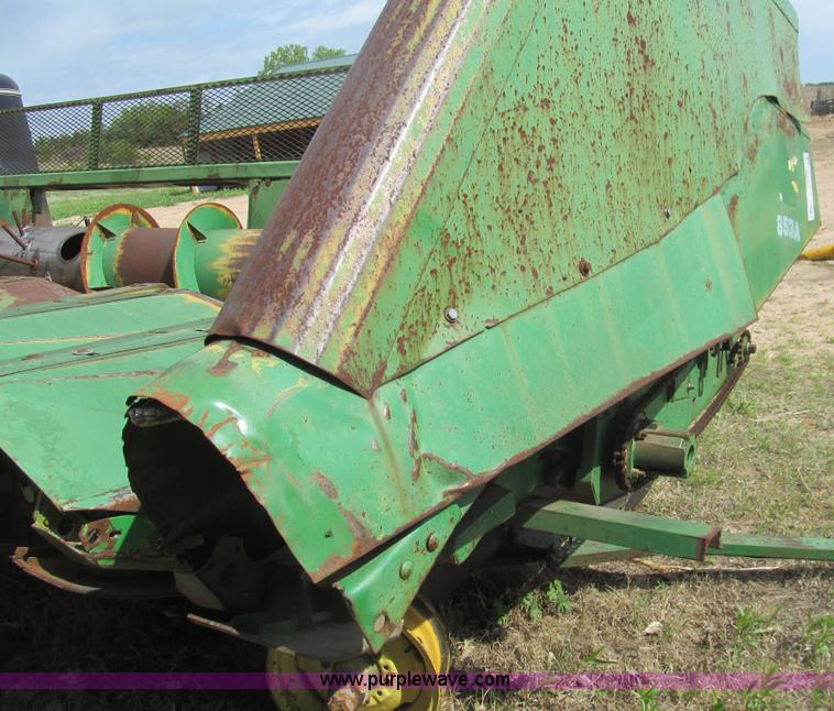 image for item I7018 John Deere 853A eight row corn head