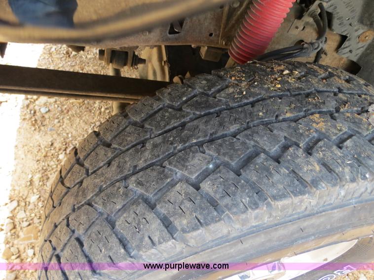 image for item B4914 2003 Ford F250 Super Duty XLT Crew Cab pickup truck