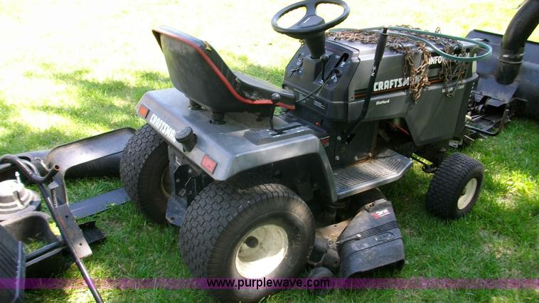 image for item D1011 Craftsman riding mower with snow thrower attachment