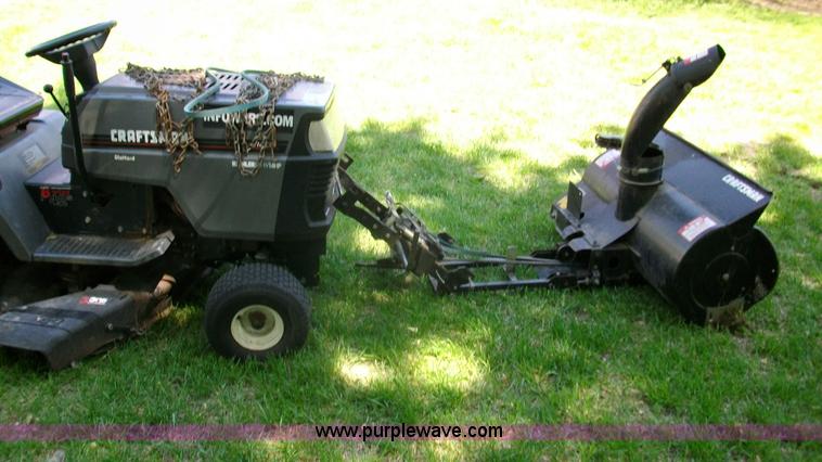 image for item D1011 Craftsman riding mower with snow thrower attachment