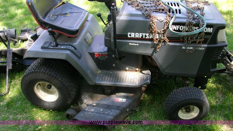 image for item D1011 Craftsman riding mower with snow thrower attachment