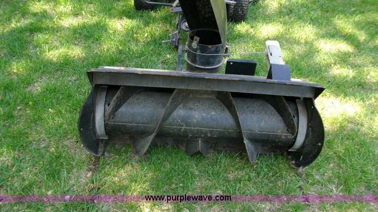 image for item D1011 Craftsman riding mower with snow thrower attachment