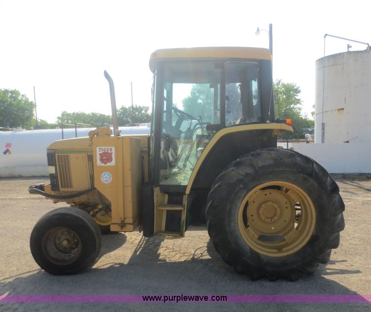 image for item F6968 1994 John Deere 6400 tractor