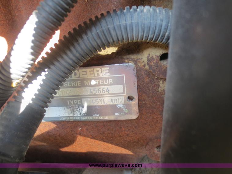 image for item F6968 1994 John Deere 6400 tractor