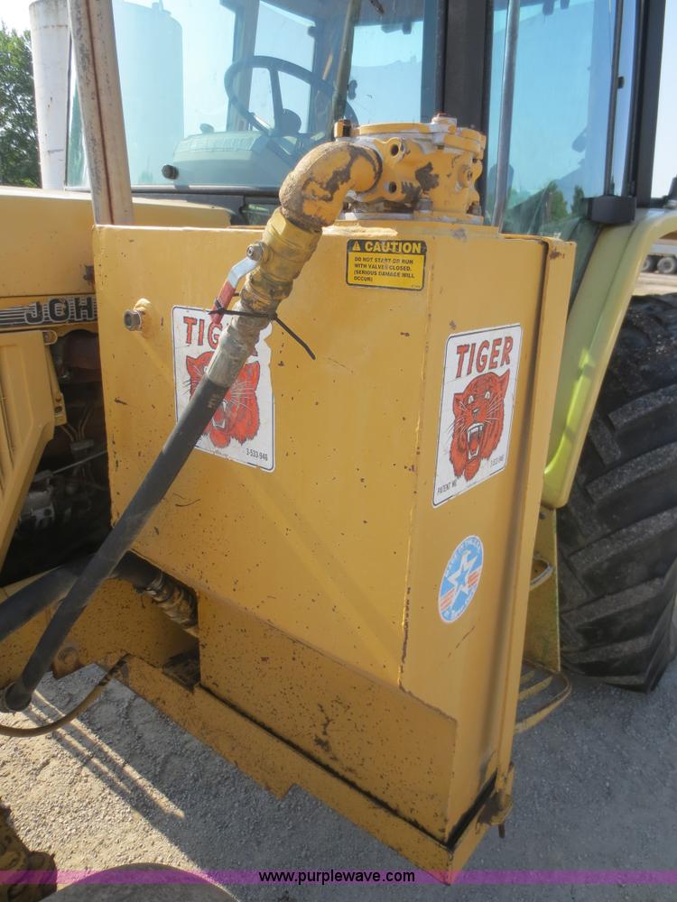 image for item F6968 1994 John Deere 6400 tractor