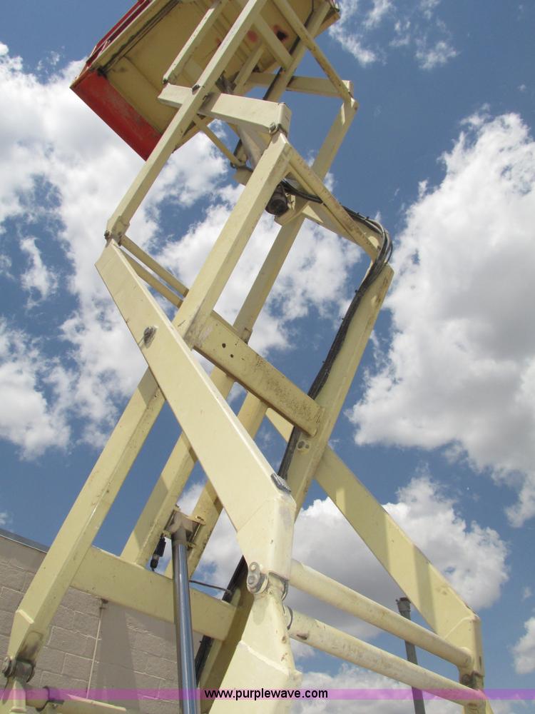 image for item F7387 2002 JLG 2646-E2 electric scissor lift