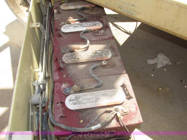 image for item F7387 2002 JLG 2646-E2 electric scissor lift