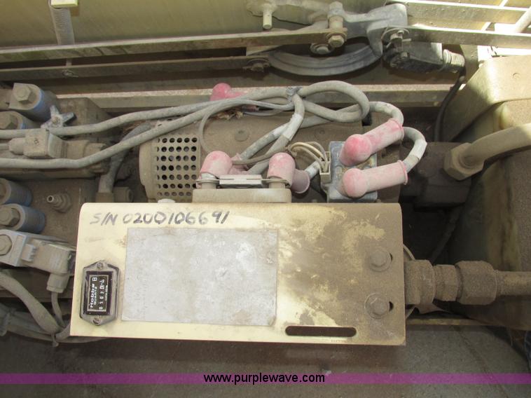 image for item F7387 2002 JLG 2646-E2 electric scissor lift