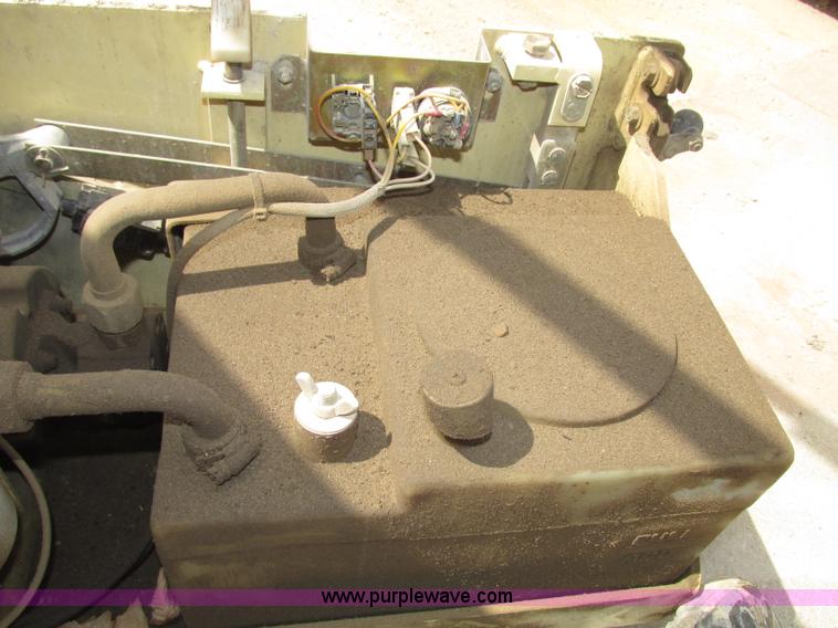 image for item F7387 2002 JLG 2646-E2 electric scissor lift