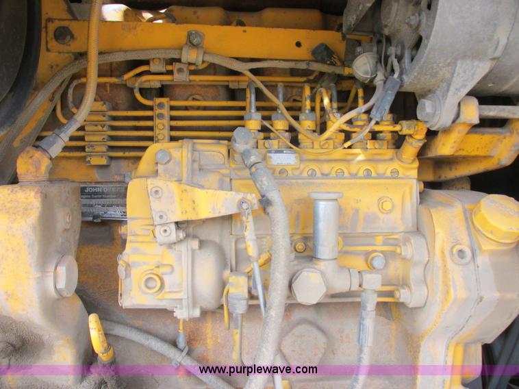 image for item I2627 1988 John Deere 770B articulated motor grader