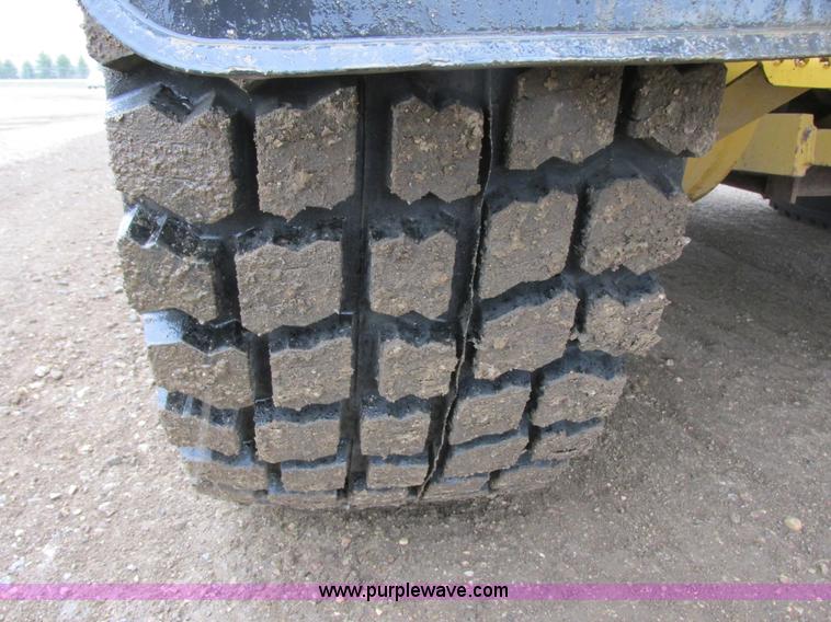 image for item I2633 2009 Caterpillar 140M AWD motor grader