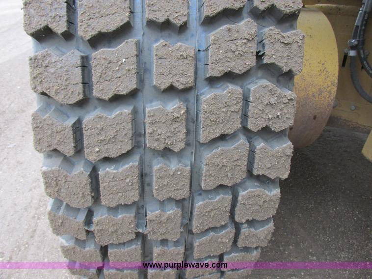 image for item I2633 2009 Caterpillar 140M AWD motor grader