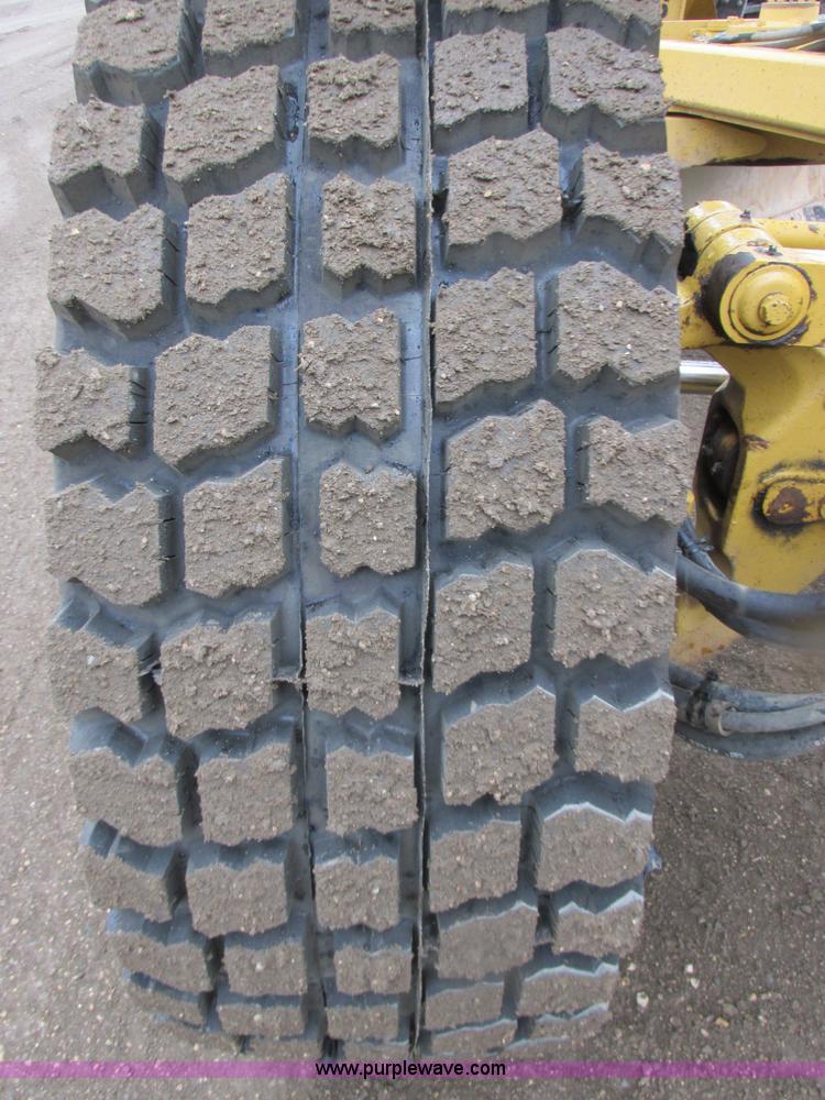 image for item I2633 2009 Caterpillar 140M AWD motor grader