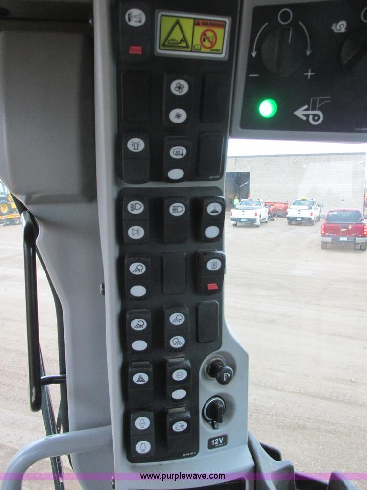 image for item I2633 2009 Caterpillar 140M AWD motor grader