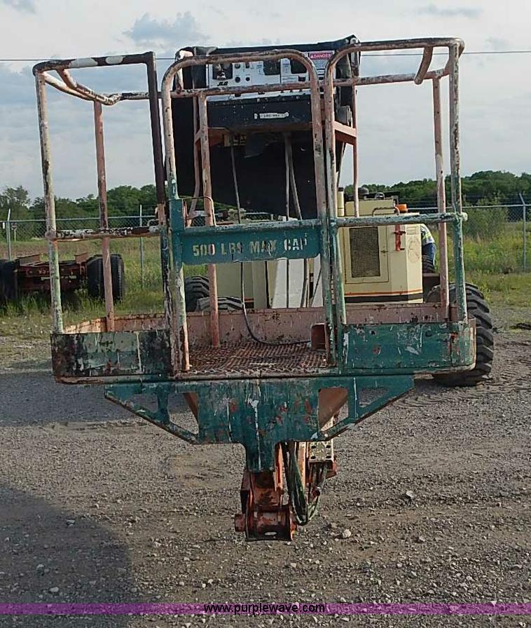 image for item I3618 1990 JLG 60HA boom lift