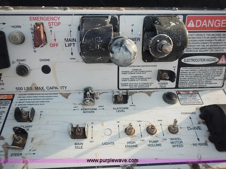 image for item I3618 1990 JLG 60HA boom lift