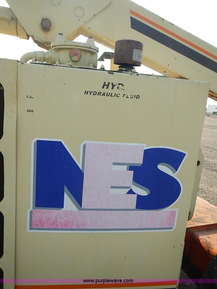 image for item I3618 1990 JLG 60HA boom lift